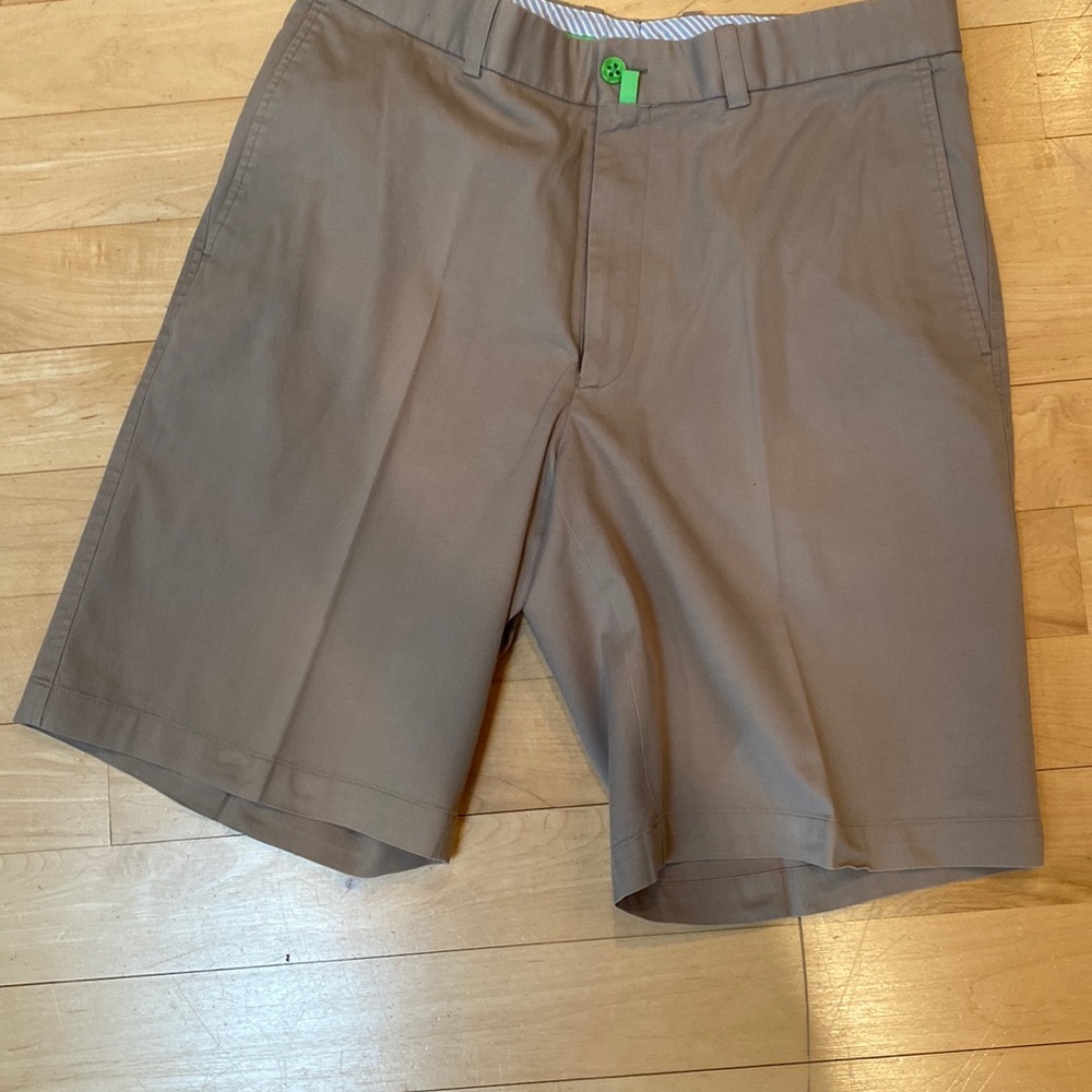 Betenly tan flat front shorts.